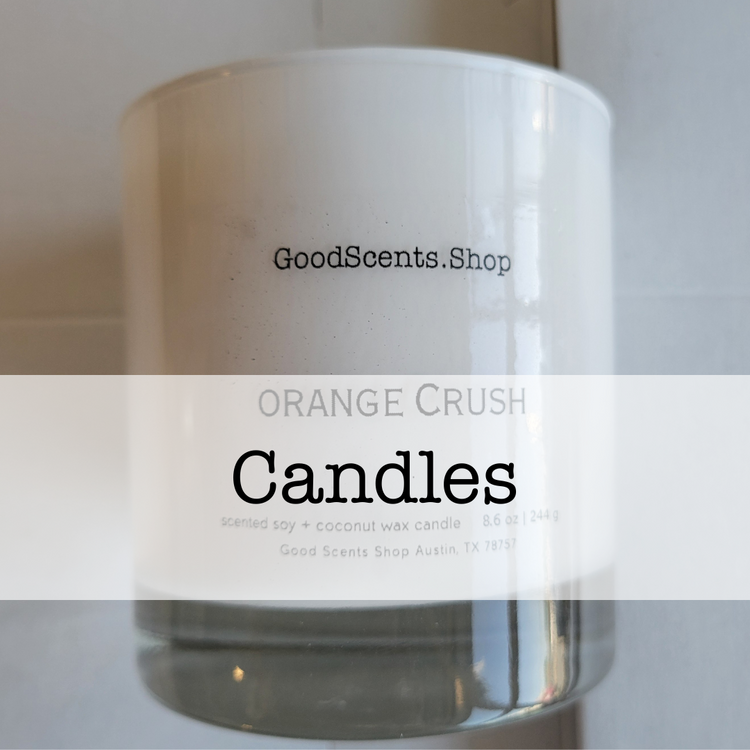 Good Scents Shop candle category image featuring a white glass heavy base tumbler containing an Orange Crush scented candle.